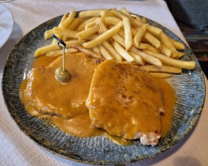 Hausspezialität seit 1964 Palma (Schweinerückensteak in pikanter Currysauce) ... - Restaurant & Vinothek Unger - Pitten