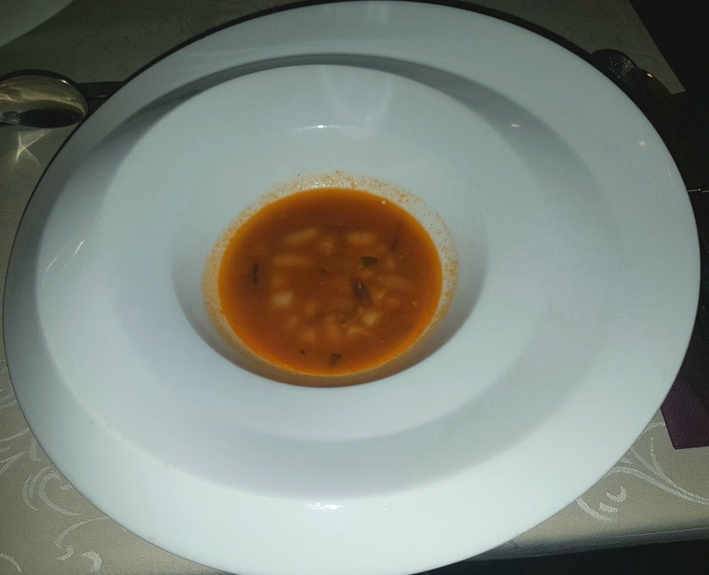 Gruß aus der Küche: Fisch/Bohnen Suppe - Osteria Dal Toscano - Wien