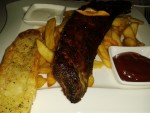 ClockTower - BBQ-Baby Back Ribs (EUR 12,50 - Steakfries, Knoblauchbrot, BBQ-Sauce &amp; Sour Cream) ...