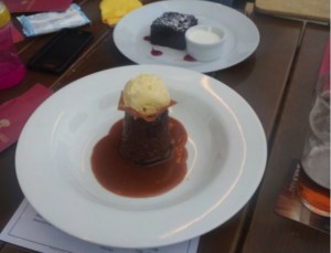 Warm Sticky Toffee Pudding with Butterscotch Sauce, Vanilla Ice Cream
(Brownie in the back)