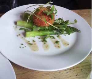 Soft Poached Hens Egg wrapped in Prosciutto, Green Buttered Asparagus and Dressed Watercress